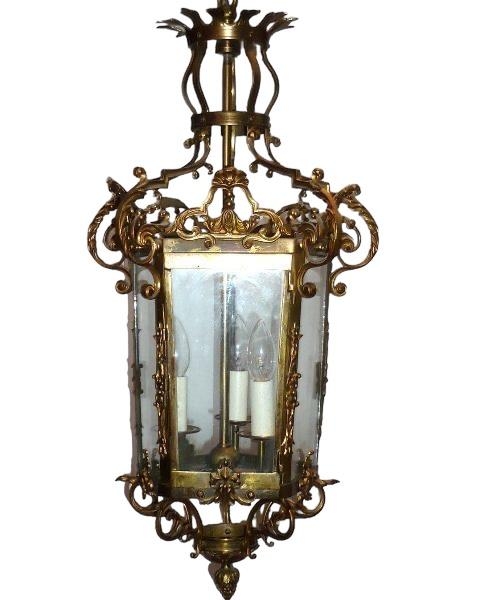 A 19TH CENTURY VICTORIAN GILT BRASS HALL LANTERN Decorated with shells and scrolling foliage. (