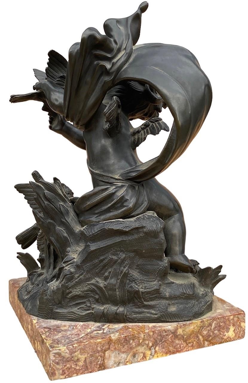 MANNER OF VICTOR PAILLARD, A 19TH CENTURY BRONZE WINGED CHERUB AND A PAIR OF DOVES Supported on a - Image 2 of 5