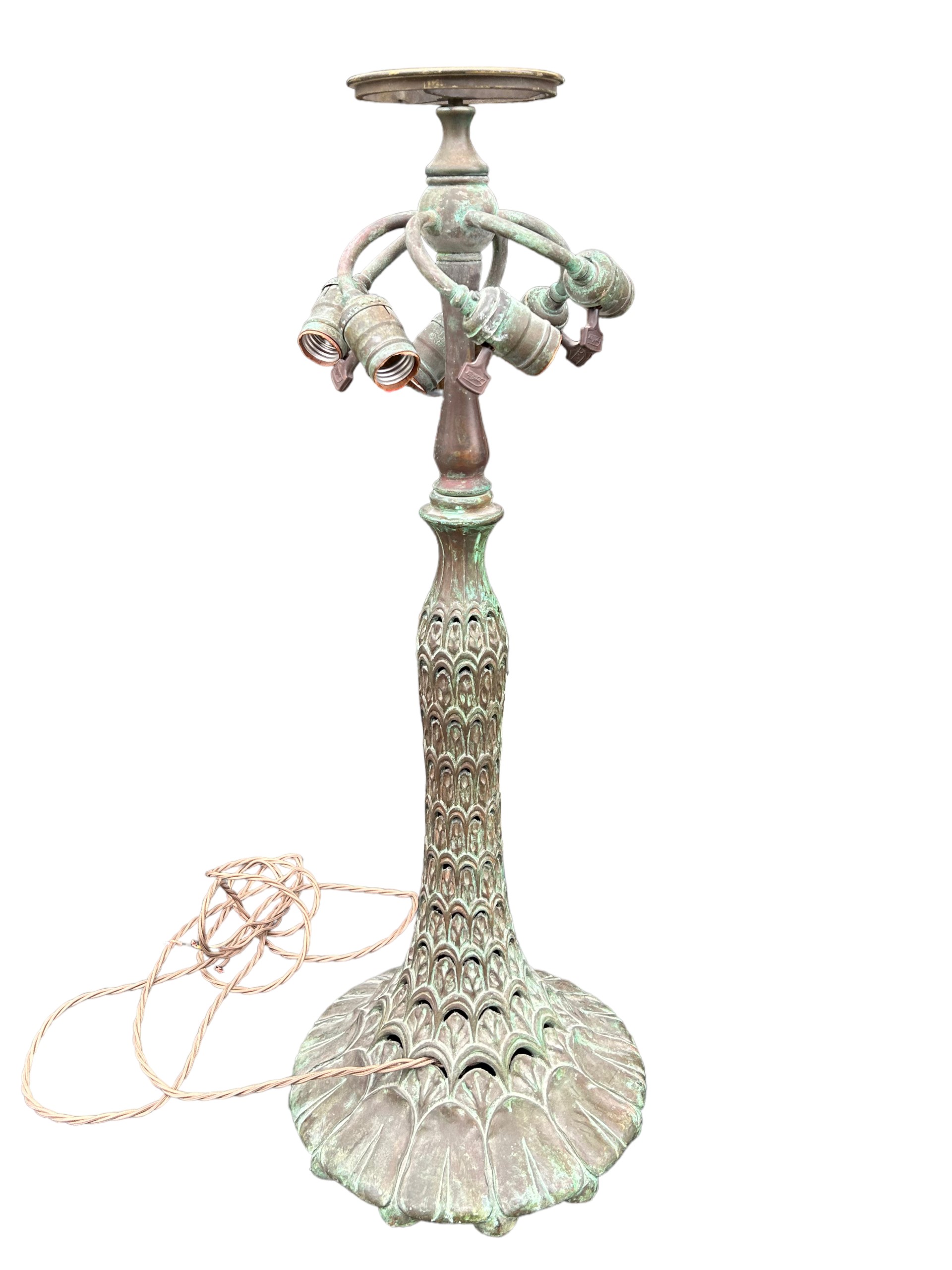 A LARGE AND IMPRESSIVE, TIFFANY DESIGN BRONZE TABLE LAMP Having six light fittings, pierced arched