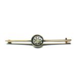 A 14CT ROSE GOLD AND DIAMOND BAR BROOCH The central bezel set with a brilliant cut diamond inside