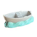 A 20TH CENTURY ART DECO POOLE POTTERY ROWING BOAT ASHTRAY, SHAPE 542, PROBABLY DESIGNED BY JOHN