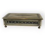 A MID 20TH CENTURY IRAQI/IRANIAN SILVER NIELLO RECTANGULAR CIGARETTE BOX Raised on four bunn feet,