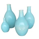 FOUR 20TH CENTURY POOLE POTTERY GRADUATED BOTTLE NECK VASES. SHAPES 691, 690, 689 AND 688 Probably