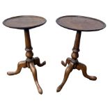 TWO GEORGE III DESIGN POLLARD OAK TRIPOD KETTLE STANDS The circular top support on turned columns