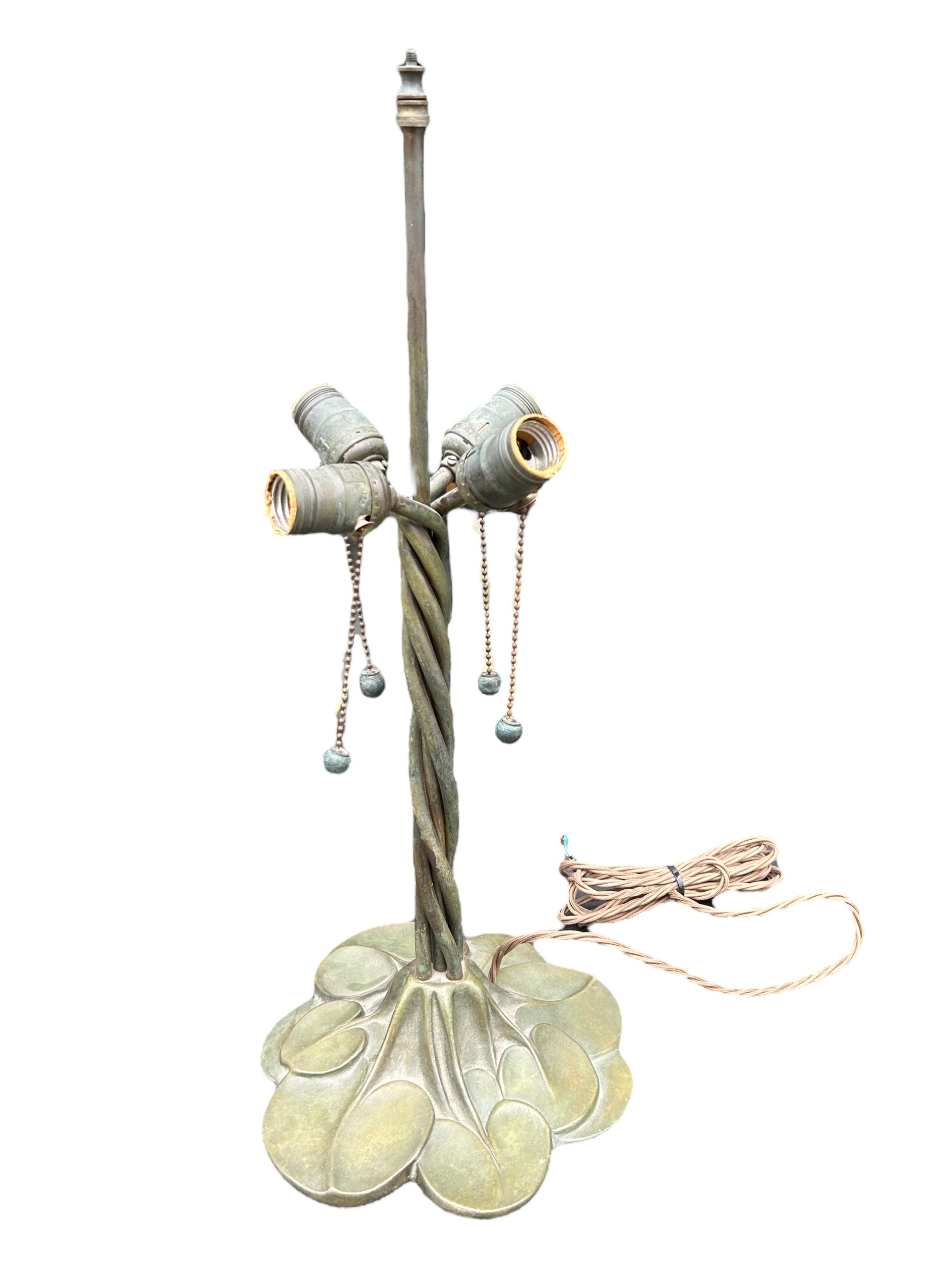 A LARGE TIFFANY DESIGN BRONZE TABLE LAMP Having three four fittings, stylised barley twist body on