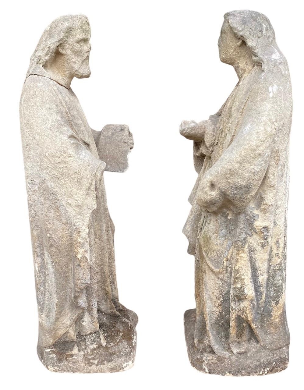 A PAIR OF 18TH CENTURY CARVED LIMESTONE FIGURES OF JOSEPH AND MARY. (h 71cm) - Image 2 of 4