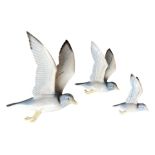 THREE 20TH CENTURY POOLE POTTERY GRADUATED SET OF FLYING SEAGULLS, DESIGNED AND MODELLED BY JOHN