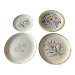 A COLLECTION OF THREE 20TH CENTURY FLORAL POOLE POTTERY CHARGERS, TOGETHER WITH A FLORAL POOLE