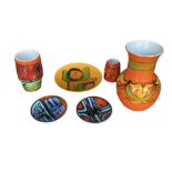 JUDI EVANS, CYNTHIA BENNETT, A COLLECTION OF SIX POOLE POTTERY DELPHIS WARE ITEMS To include a
