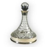 BRUCE RUSSELL, A LARGE SILVER TOPPED SHIPS DECANTER AND COASTER Hallmarked Guernsey, 2001, pressed