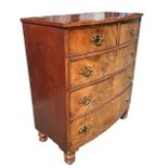 A 19TH CENTURY MAHOGANY BOW FRONTED CHEST OF TWO SHORT OVER THREE LONG GRADUATED DRAWERS Raised on