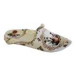 MEISSEN, A 19TH CENTURY HARD PASTE PORCELAIN NOVELTY MODEL OF A SHOE/SLIPPER Painted with