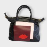 LULU GUINNESS, A LEATHER HANDBAG Having red, burgundy and lilac leather on black leather ground,