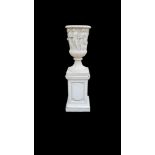 AFTER THE ANTIQUE, A LARGE FAUX MARBLE MEDICI URN On plinth base. (145cm) Condition: good overall,