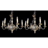 A PAIR OF 18TH CENTURY STYLE ROCOCO SILVER PLATED SIX BRANCH CHANDELIERS. (d 70cm x w 65cm)