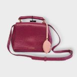 LULU GUINNESS, A SMALL MAGENTA LEATHER RITA SHOULDER BAG With black monogram interior, complete with