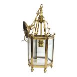 A MID 20TH CENTURY LOUIS XIV STYLE HEAVY SOLID BRASS ENTRANCE HALL LANTERN Gilded brass, the