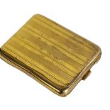 AN EARLY 20TH CENTURY 9CT GOLD RECTANGULAR MATCHCASE With engine turned decoration. (approx 4cm x