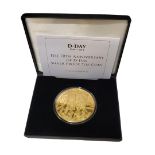 A SILVER GILT 'D-DAY LANDINGS' 5OZ FIVE CROWNS PROOF COIN, DATED 2014 Issued at The Isle of Man with