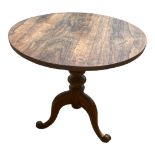 A VICTORIAN ROSEWOOD OCCASIONAL TABLE The circular top raised on a bulbous turn column with three