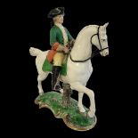 A NYMPHENBURG LATE 19TH/EARLY 20TH CENTURY HARD PASTE PORCELAIN FIGURAL GROUP, PRUSSIAN HUNTER ON