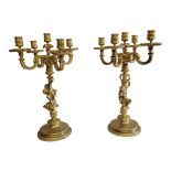 A LARGE PAIR OF 20TH CENTURY GILT BRONZE FIGURAL CANDELABRA Each having four branch arms,