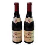 L'HERMITAGE, TWO BOTTLES OF VINTAGE RED WINE, DATED 2009 Ed cap with cream label, marked Germaine