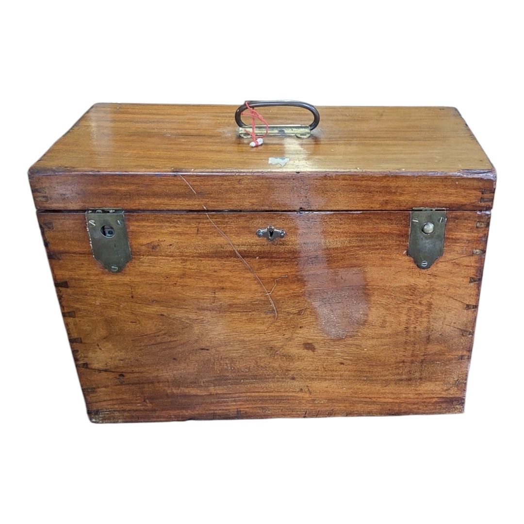A LATE VICTORIAN MAHOGANY CASED TRAVELLING CELLARET/WINE COOLER The interior fitted with a six