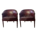 A PAIR OF VICTORIAN DESIGN TUB MAHOGANY ARMCHAIRS Maroon leather upholstery, on turned legs. (65cm x