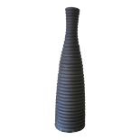 A MODERN DESIGN MAGNUM SIZE FLOOR STANDING STONEWARE VASE Of ribbed textured design by Ikea, maded