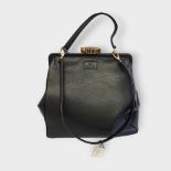 LULU GUINNESS, A MEDIUM BLACK LEATHER EVA BAG With gilt brass clasp and black striped interior,