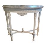 A REGENCY STYLE MARBLE TOPPED CONSOLE TABLE On a cream painted wooden base. (110cm x 42cm x 102cm)