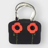 LULU GUINNESS, A MEDIUM BLACK FABRIC JENNY POPPY BAG With black and stone leather, perspex clasp and