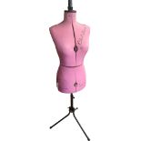 A VINTAGE LADIES’ TAILORS DUMMY Chil-Daw, in pink cloth with metal stand. (150cm) Condition: good