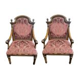 A PAIR OF REGENCY STYLE FAUX MAHOGANY AND PARCEL GILT OPEN ARMCHAIRS, in tapestry upholstery.