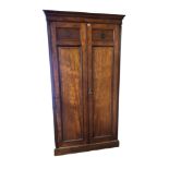HEALS AND SONS, LONDON, AN EDWARDIAN SOLID MAHOGANY COMPACTUM WARDROBE With cushion cornice above