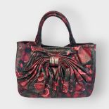 LULU GUINNESS, A SMALL LEATHER WINTER FLORAL HANDBAG With large bow to front, complete with dust