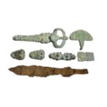 A COLLECTION OF BRONZE AGE ITEMS TO INCLUDE BUCKLE, LEATHER STUDS AND OTHERS. Together with A