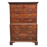 A GEORGE III MAHOGANY CHEST ON CHEST With two short over six long graduated drawers, raised on