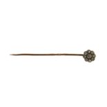 A VICTORIAN YELLOW METAL AND DIAMOND CLUSTER STICK PIN, YELLOW METAL TESTED AS 14CT GOLD Central