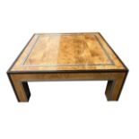 MANNER OF PAUL EVANS, A 20TH CENTURY BURR WOOD AND METAL MOUNTED COFFEE TABLE.