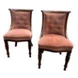 A PAIR OF 19TH CENTURY OAK LIBRARY CHAIRS With scrolling backs above serpentine seat, raised on