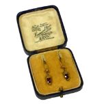 A PAIR OF VICTORIAN YELLOW METAL AND GARNET EARRINGS, YELLOW METAL TESTED AS 9CT GOLD Oval cut