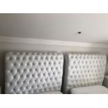 A PAIR OF CREAM BUTTON BACK LEATHER UPHOLSTERED SINGLE BEDSTEADS. (106cm x 131cm) Condition: good