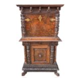 A 17TH/18TH CENTURY ITALIAN CARVED WALNUT AND BURR WALNUT BAMBOCCI CABINET With two single drawer