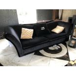 FENDI, A BLACK VELVET UPHOLSTERED THREE SEAT SETTEE With sunken back and scroll ends. (286cm x 105cm