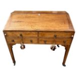 AN EARLY 19TH CENTURY MAHOGANY WRITING BUREAU The fall front opening to reveal fitted interior above