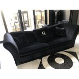 FENDI, A BLACK VELVET UPHOLSTERED THREE SEAT SETTEE With sunken back and scroll ends. (286cm x 105cm