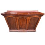 AN UNUSUAL 19TH CENTURY FLAME MAHOGANY SERPENTINE SIDEBOARD With scrolling back above three