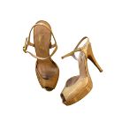 STUART WEITZMAN FOR RUSSELL AND BROMLEY, A PAIR OF TAN PATENT PEEP TOE PLATFORM SHOES, size 38